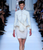 ** Givenchy Spring 2012 RTW White Canvas Peplum Jacket, NYC: Kim Kardashian **